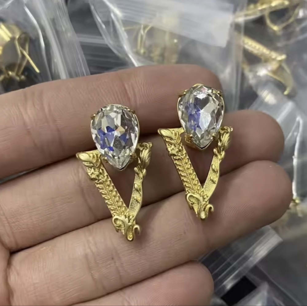 Designer Inspired V-Shaped Gold Diamond Stud Earrings